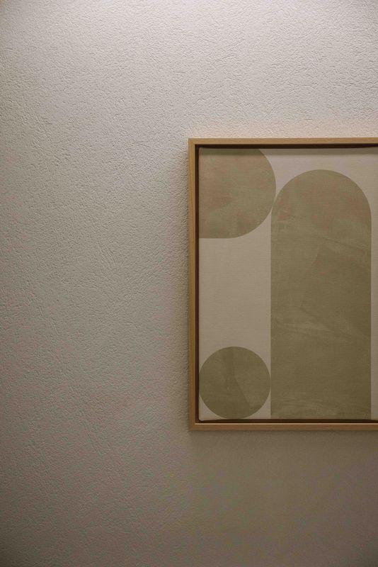 Muted artwork in the corridors at Clinic82 Limassol